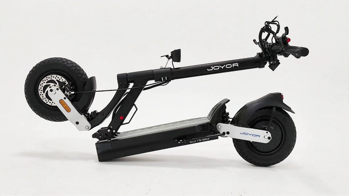JOYOR T12 Ultra dual motor electric scooter equipped with 12-inch off-road tires for European road compliance.