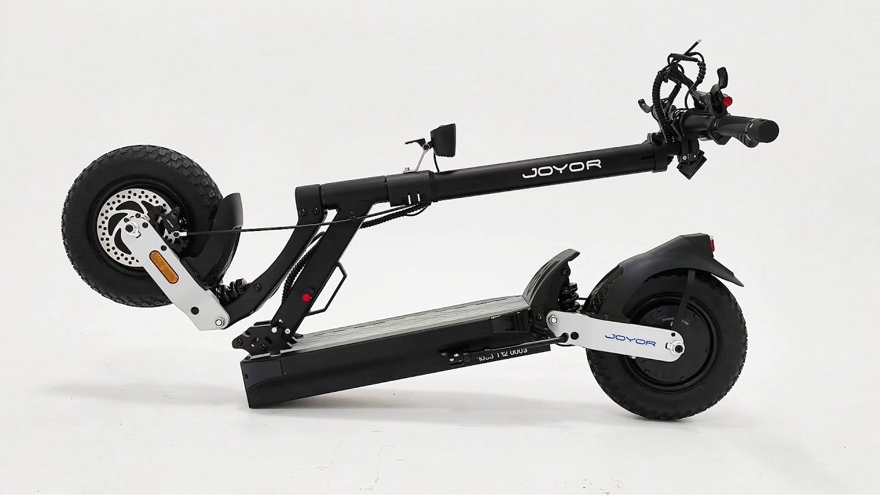 JOYOR T12 Ultra dual motor electric scooter equipped with 12-inch off-road tires for European road compliance.